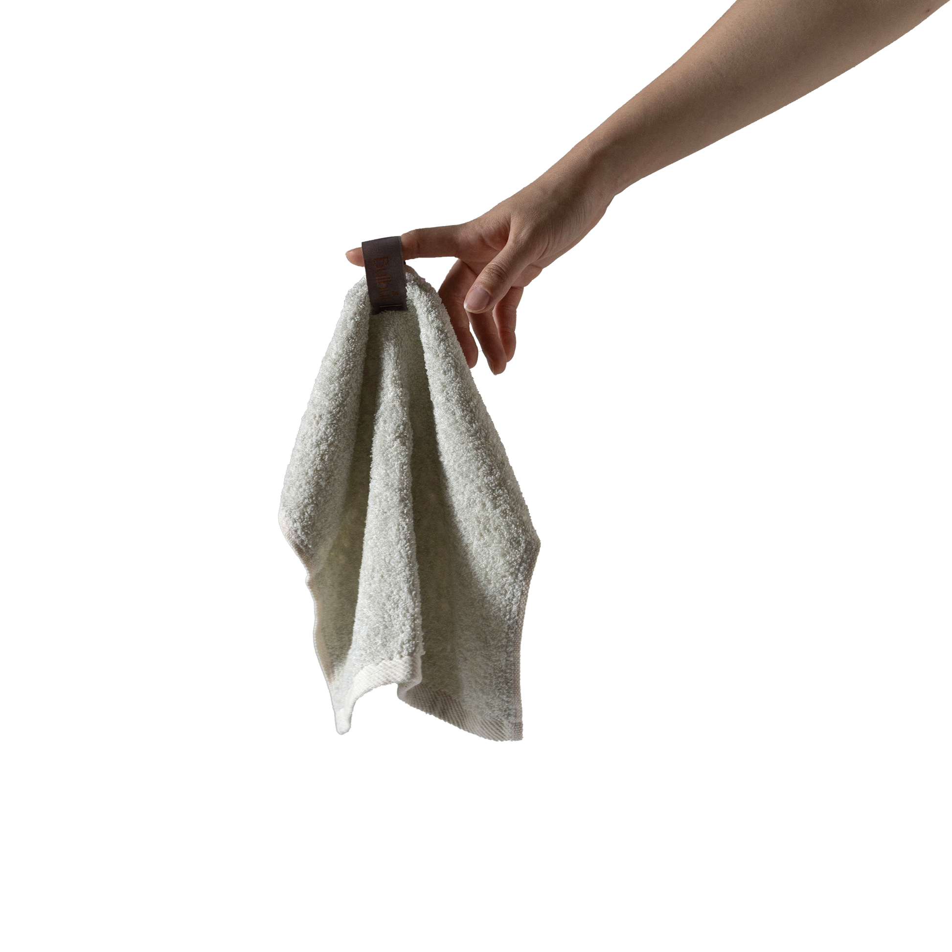 Bulbul Self-sanitizing Premium Copper Face Towel held by hand, showcasing antibacterial and odour-resistant washcloth for home and bath use.